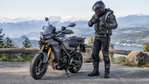 Motorcyclist wearing an electronic motorcycle airbag vest with protective riding gear